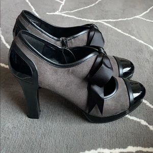 Black and grey heeled Mary Jane shoe